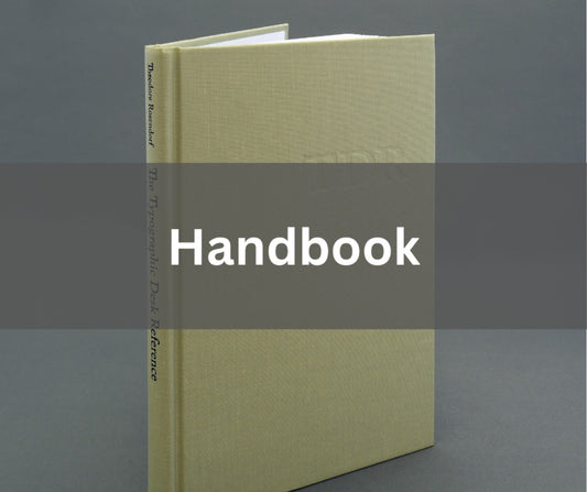 A cover image of a bound employee handbook with the title prominently displayed.