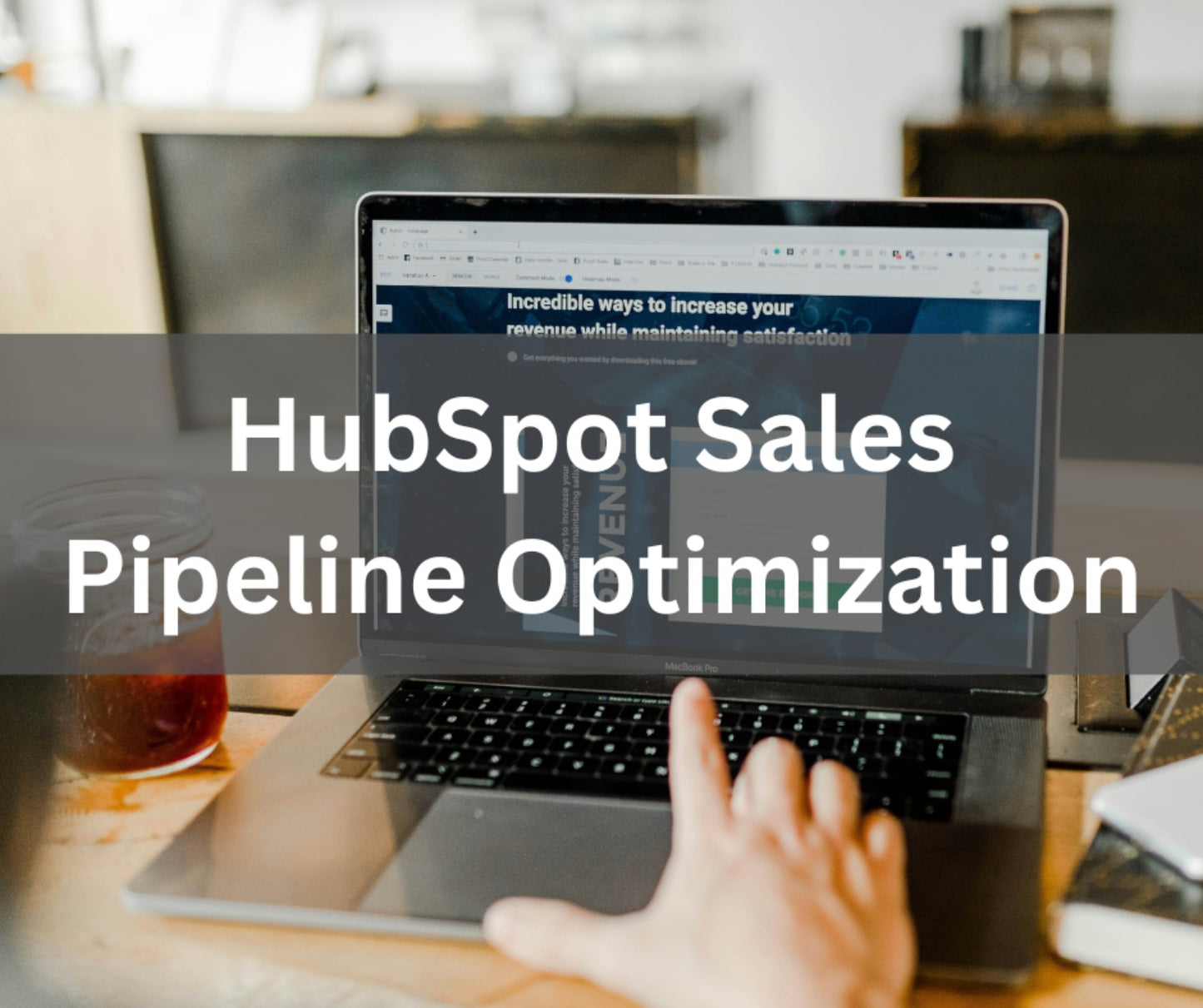 A laptop displaying the HubSpot Sales Pipeline Optimization page with a person's hand pointing at the screen.
