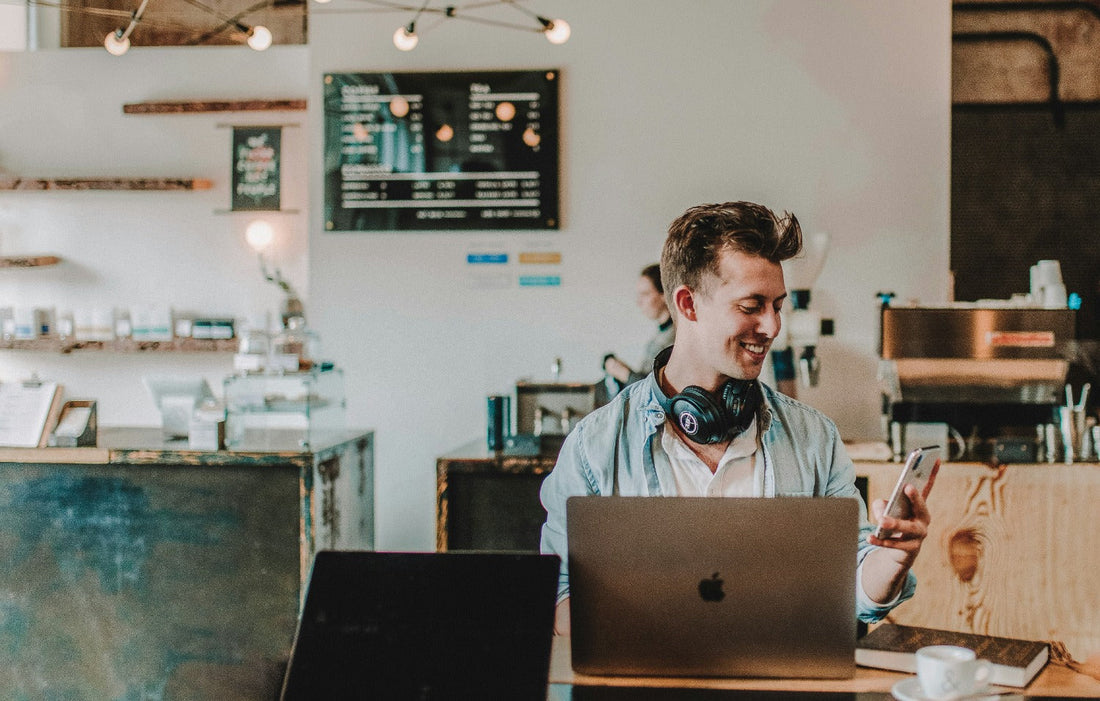 Man at computer, KPI metrics that drive business growth