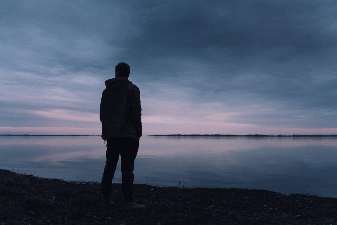 Man alone at a vista. Leaders are often lonely and have special responsibilities and stressses.