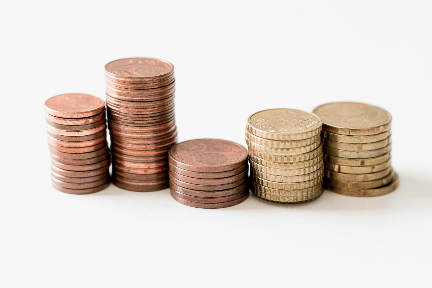 Stacked coins. Track your finances.