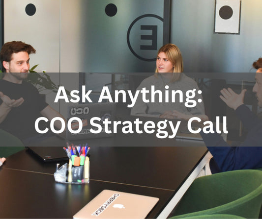 COO Strategy Call to get the business streamlined. People at a desk collaborating. 