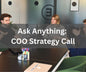 COO Strategy Call to get the business streamlined. People at a desk collaborating. 
